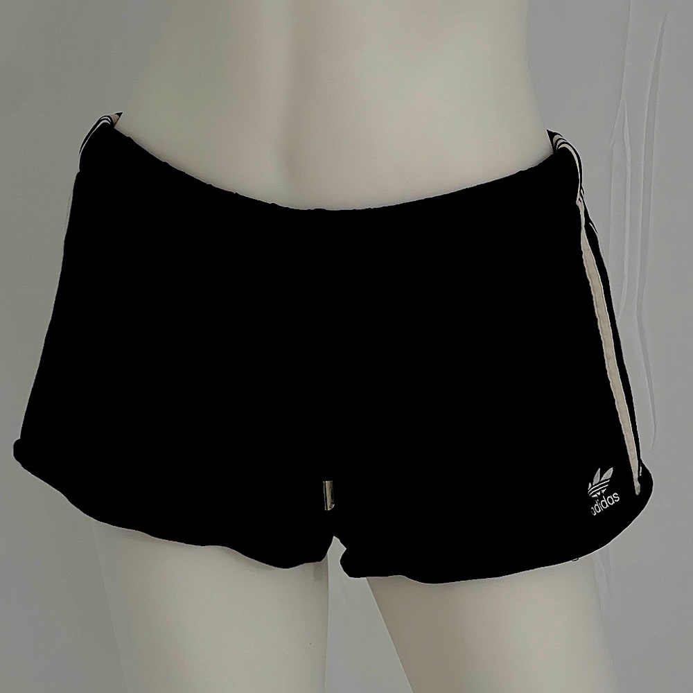Black Adidas shorts.